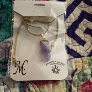 Amethyst pendant on leather thong